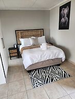 Room in B&B - Khutsong Apartmentss