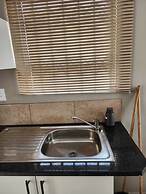 Room in B&B - Khutsong Apartmentss