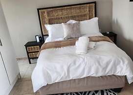 Room in B&B - Khutsong Apartmentss