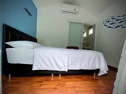 Ozone Beach House & Rooms