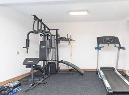 Relaxing Holiday Home With Pool, Fitness Area, and Entertainment Facil