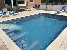 Tranquil Holiday Home With Pool, Garden, and Playground in a Peaceful