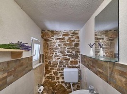 Elegant Stone House With Jacuzzi, Terrace, and Private Yard in Solta