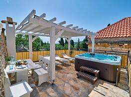 Elegant Stone House With Jacuzzi, Terrace, and Private Yard in Solta