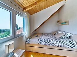 Elegant Stone House With Jacuzzi, Terrace, and Private Yard in Solta