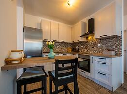 Charming and Tranquil Kastel Gomilica Apartment With Balcony and Patio