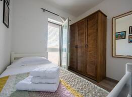 Charming and Tranquil Kastel Gomilica Apartment With Balcony and Patio