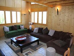 Chalet Nestled in Mountains and Garden