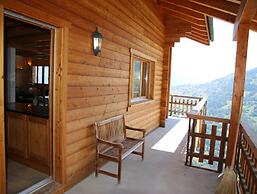 Chalet Nestled in Mountains and Garden