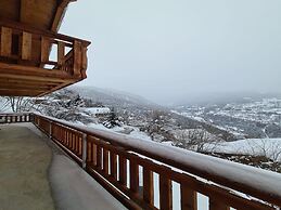 Spacious Chalet With Patio Facing Mountains