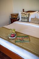 Amã Stays & Trails Mangirish Farmhouse, Alur, Bengaluru