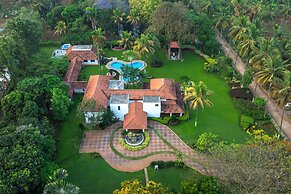 Amã Stays & Trails Mangirish Farmhouse, Alur, Bengaluru