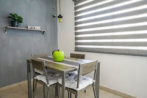 Poliforum Modern 2BR Modern Apartment