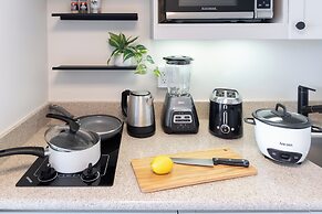 Pacific Monarch Condos Near Waikiki Beach w/ City View & Partial Ocean