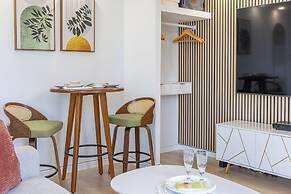 Pacific Monarch Condos Near Waikiki Beach w/ City View & Partial Ocean