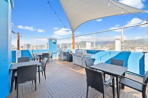Pacific Monarch Condos Near Waikiki Beach w/ City View & Partial Ocean