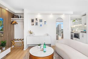 Pacific Monarch Condos Near Waikiki Beach w/ City View & Partial Ocean