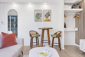 Pacific Monarch Condos Near Waikiki Beach w/ City View & Partial Ocean