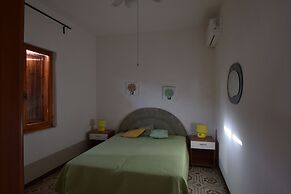 Family Apartment With Balcony In Budoni