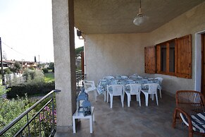 Family Apartment With Balcony In Budoni