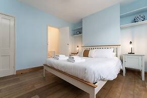 Host Stay Blue Hues on Over Street