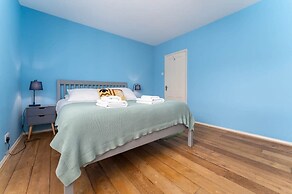 Host Stay Blue Hues on Over Street