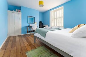 Host Stay Blue Hues on Over Street