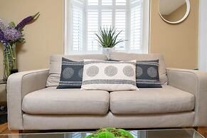 Host Stay Blue Hues on Over Street