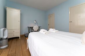 Host Stay Blue Hues on Over Street