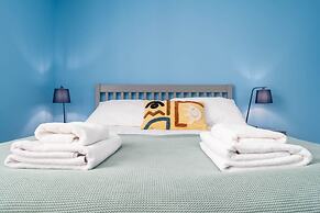 Host Stay Blue Hues on Over Street