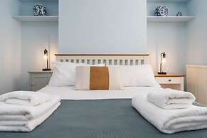 Host Stay Blue Hues on Over Street