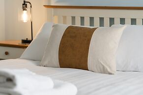 Host Stay Blue Hues on Over Street