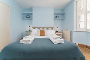 Host Stay Blue Hues on Over Street