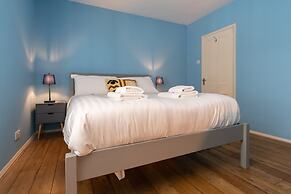 Host Stay Blue Hues on Over Street