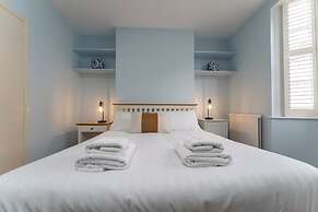 Host Stay Blue Hues on Over Street