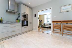 Host Stay Blue Hues on Over Street