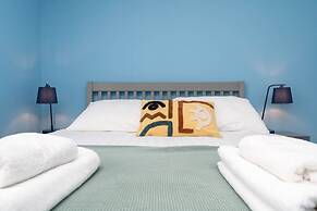 Host Stay Blue Hues on Over Street