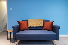 Host Stay Blue Hues on Over Street