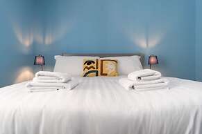 Host Stay Blue Hues on Over Street