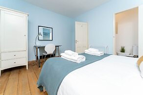 Host Stay Blue Hues on Over Street