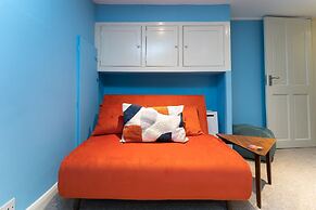 Host Stay Blue Hues on Over Street