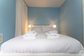 Host Stay Blue Hues on Over Street