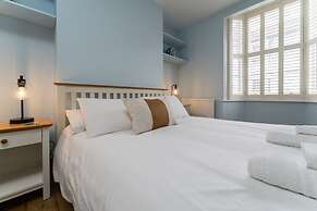 Host Stay Blue Hues on Over Street