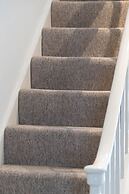 Host Stay Blue Hues on Over Street