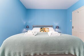 Host Stay Blue Hues on Over Street