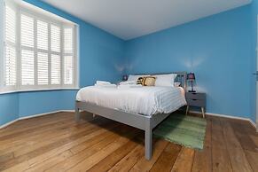 Host Stay Blue Hues on Over Street