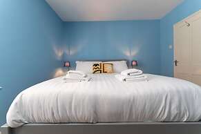 Host Stay Blue Hues on Over Street