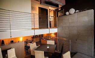 EX-L HOTEL