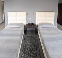 EX-L HOTEL