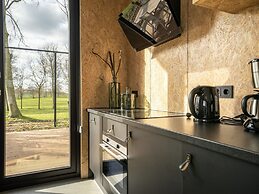 Modern Chalet by the River Maas